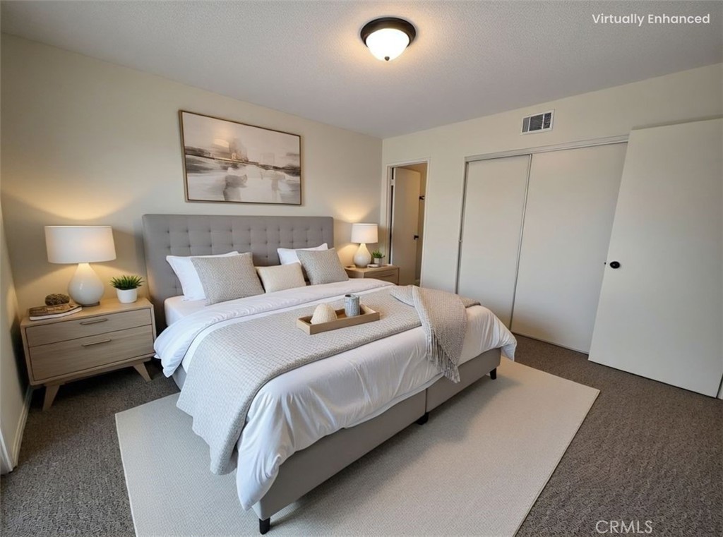 850 Vallejo Avenue Simi Valley, CA 93065 - Photo 27 of 50 a bedroom with a bed and a night stand