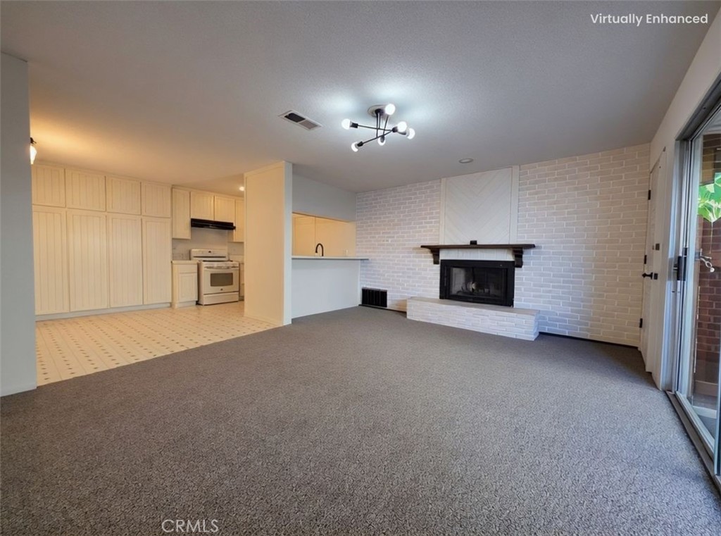 850 Vallejo Avenue Simi Valley, CA 93065 - Photo 3 of 50 a view of a livingroom with a fireplace