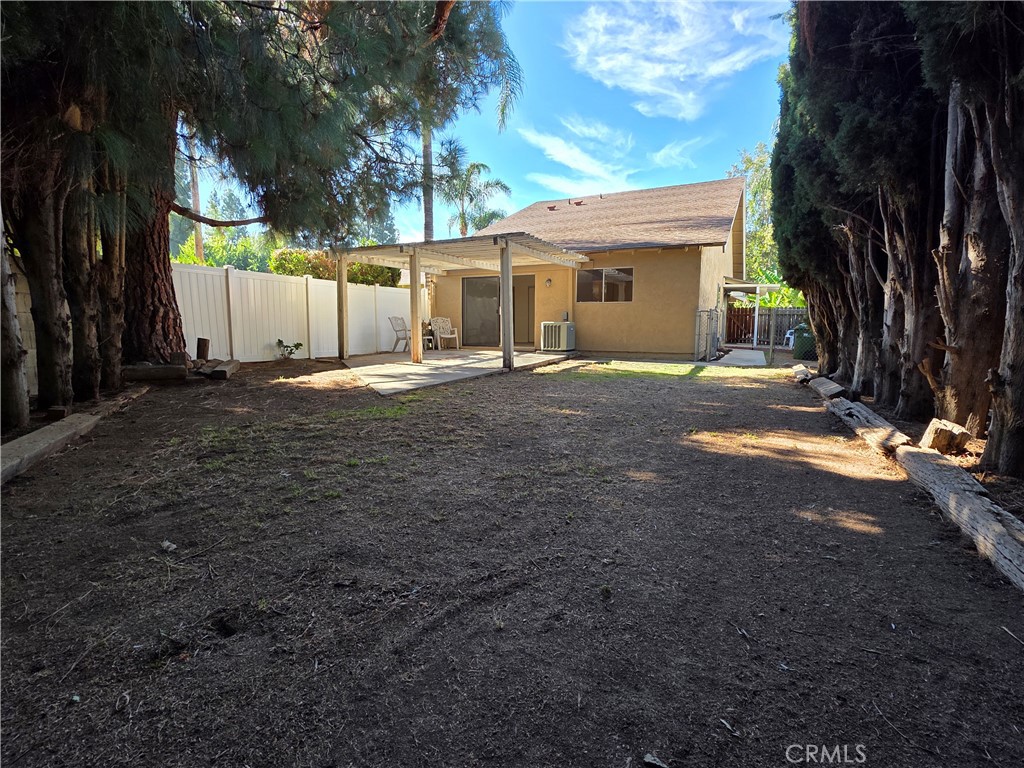 850 Vallejo Avenue Simi Valley, CA 93065 - Photo 31 of 50 a view of a house with backyard and a tree