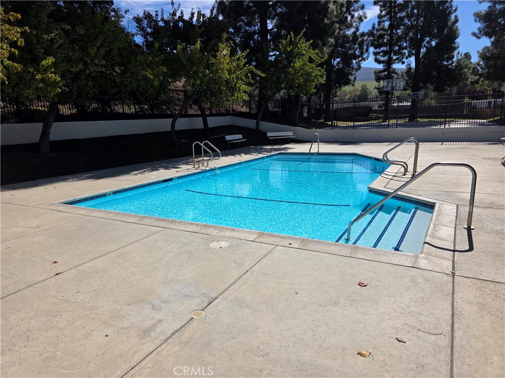 850 Vallejo Avenue Simi Valley, CA 93065 - Photo 47 of 50 a view of swimming pool with seating area and trees