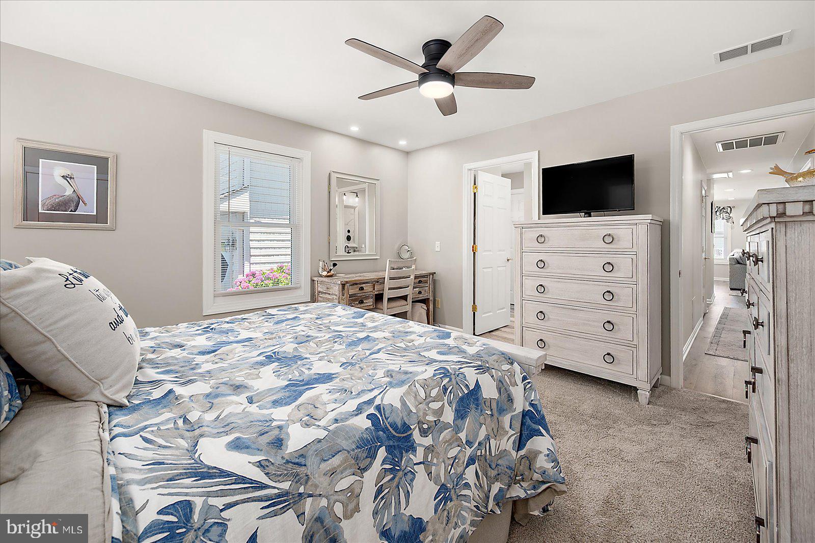 10362 Keyser Point Road Ocean City, MD 21842 - Photo 31 of 51 Serene bedroom with coastal charm.