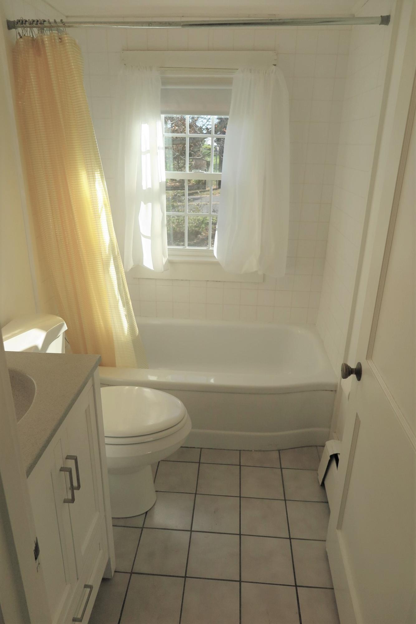 1 Hamilton Road Dennis Port, MA 02639 - Photo 17 of 29 a bathroom with a granite countertop toilet a sink and a shower