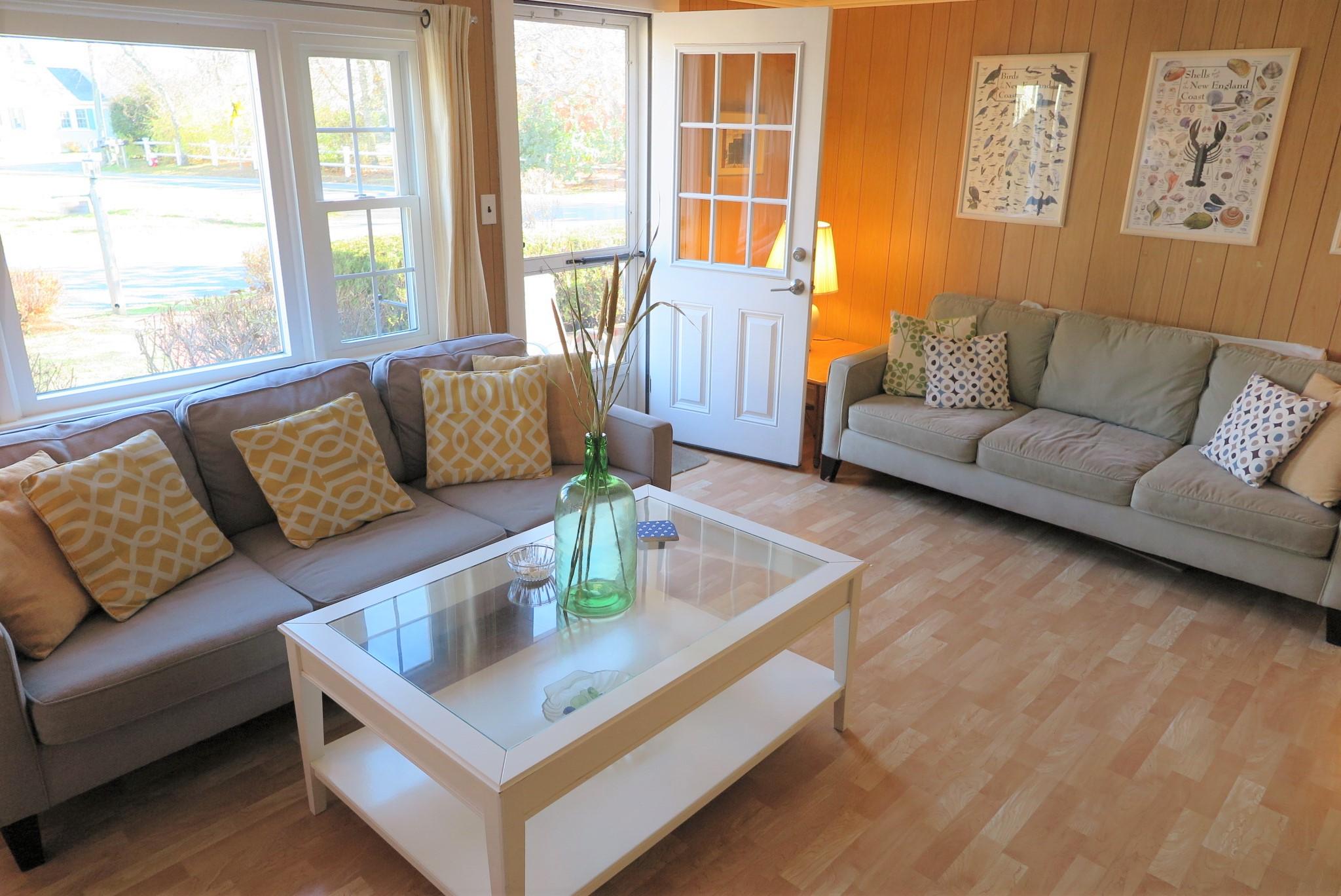 1 Hamilton Road Dennis Port, MA 02639 - Photo 5 of 29 a living room with furniture and a large window