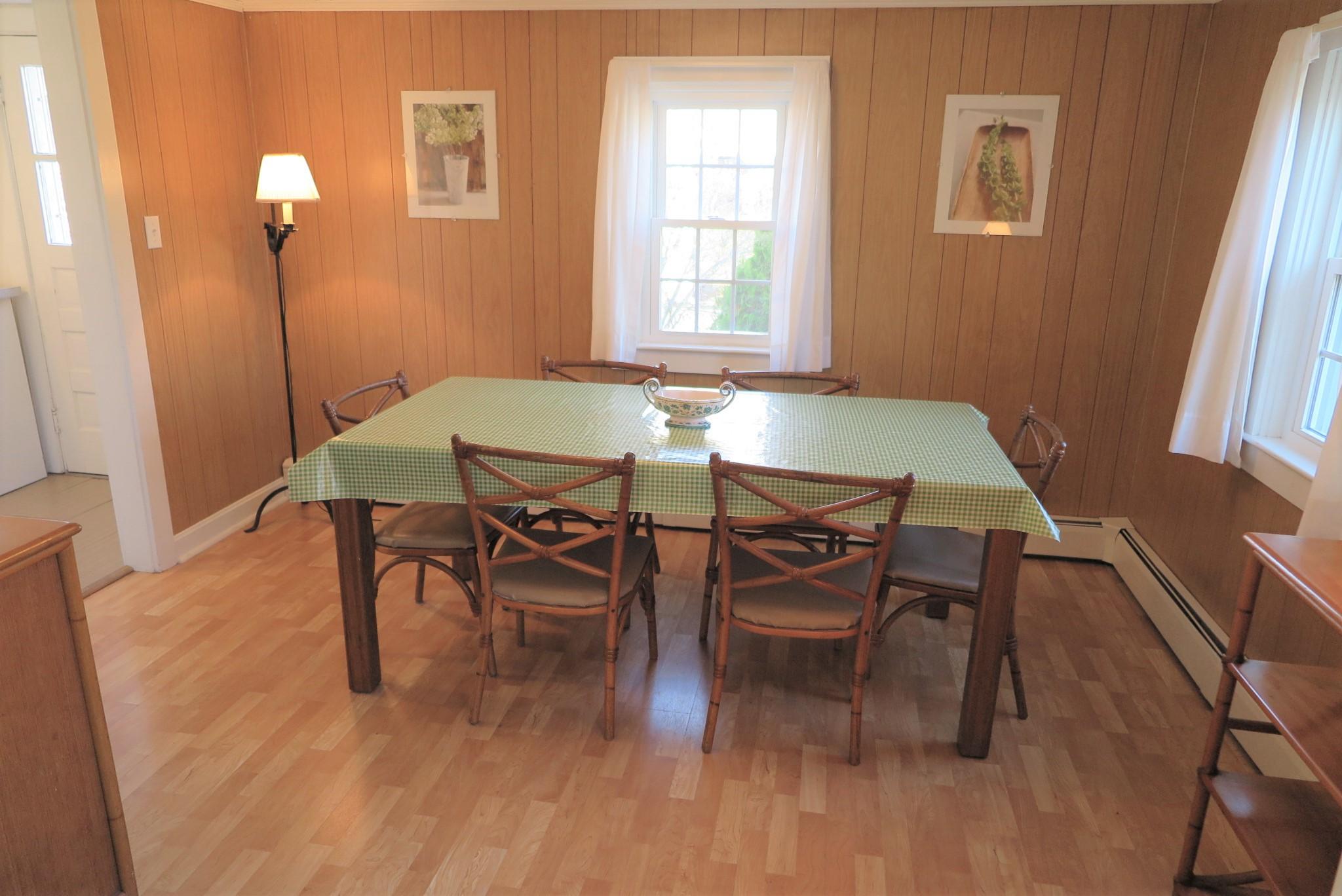 1 Hamilton Road Dennis Port, MA 02639 - Photo 6 of 29 a view of a dining room with furniture and wooden floor