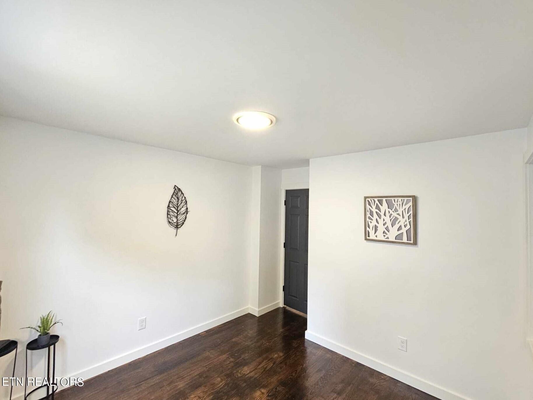 136 Main Road Maryville, TN 37804 - Photo 13 of 24 an empty room with wooden floor