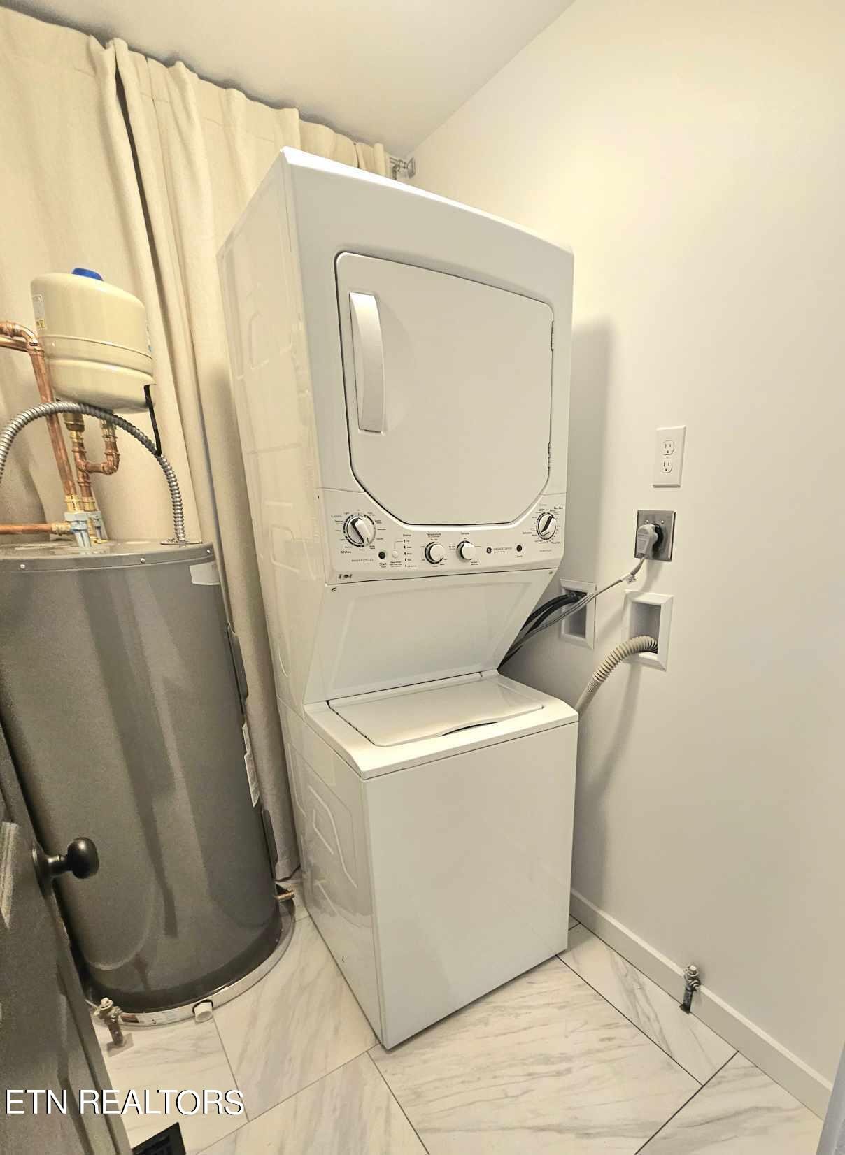 136 Main Road Maryville, TN 37804 - Photo 16 of 24 a utility room with dryer and washer