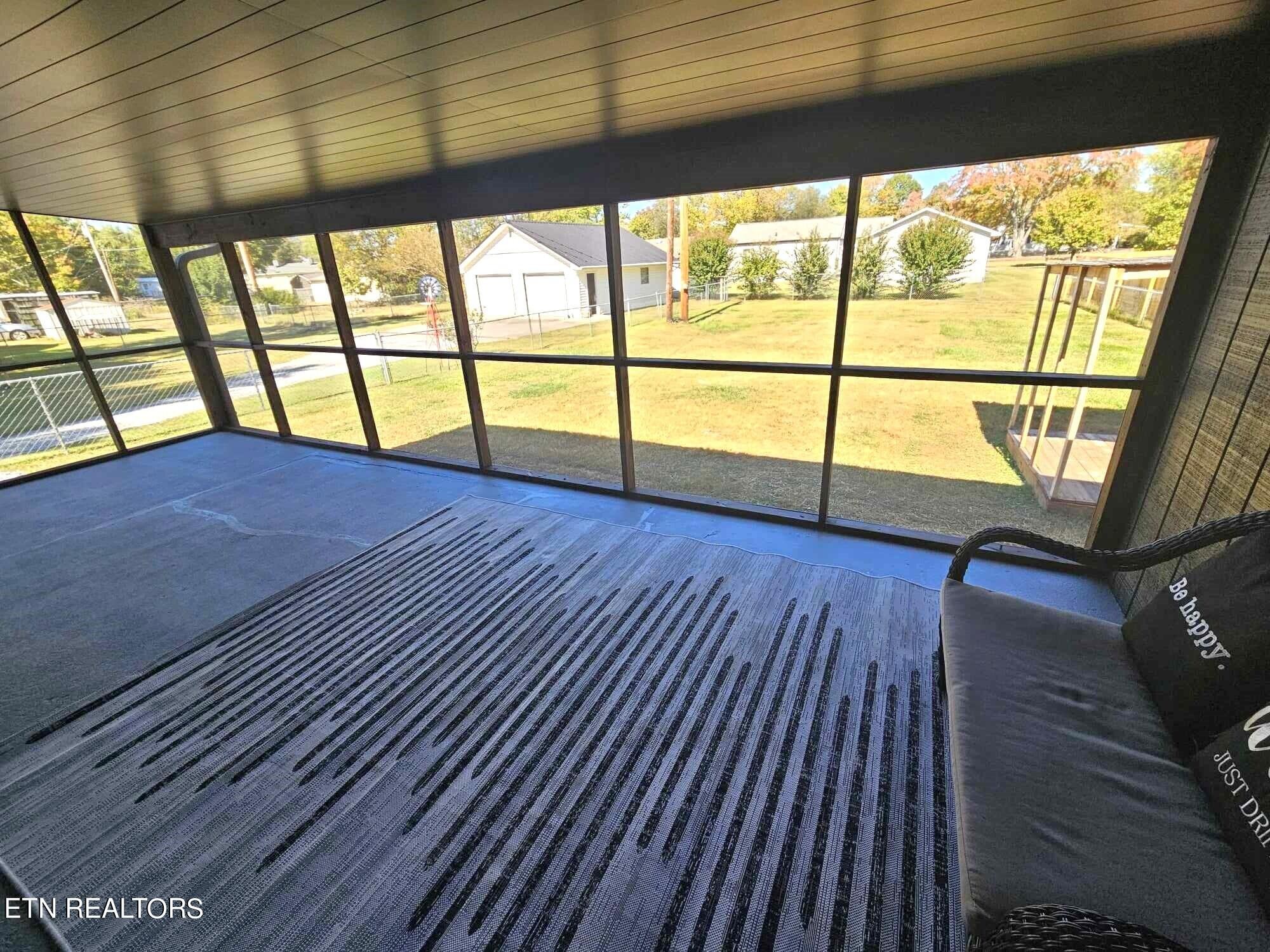136 Main Road Maryville, TN 37804 - Photo 17 of 24 a view of an empty room with wooden floor and a window