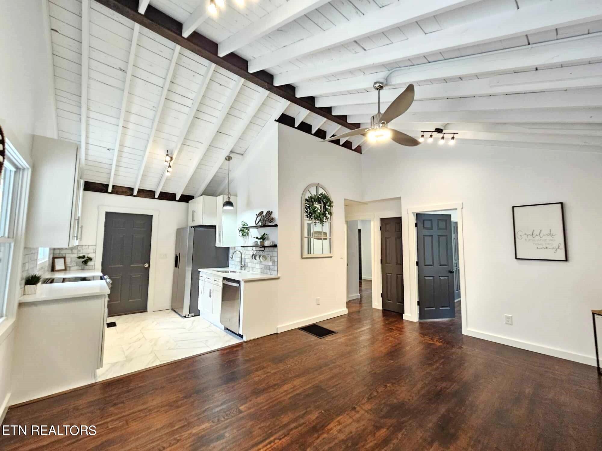 136 Main Road Maryville, TN 37804 - Photo 7 of 24 a view of a kitchen with refrigerator and microwave