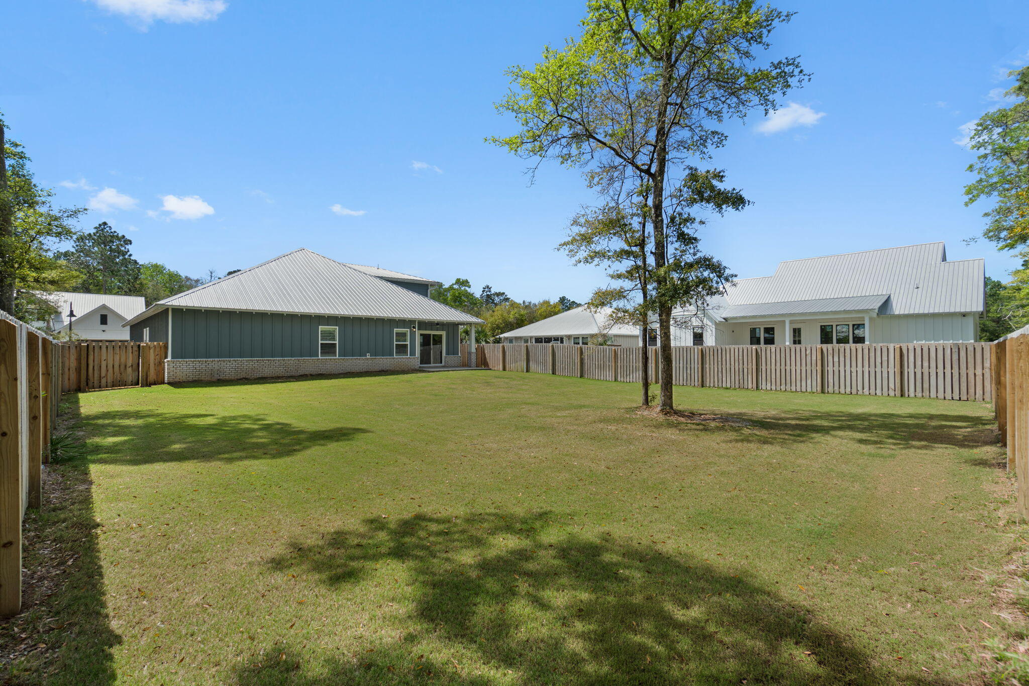 136 Hibernate Way Freeport, FL 32439 - Photo 36 of 55 a view of a house with a yard