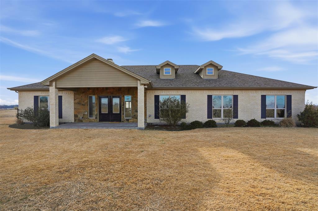 2701 County Road 1110 Rio Vista, TX 76093 - Photo 1 of 39 front view of a house and a yard