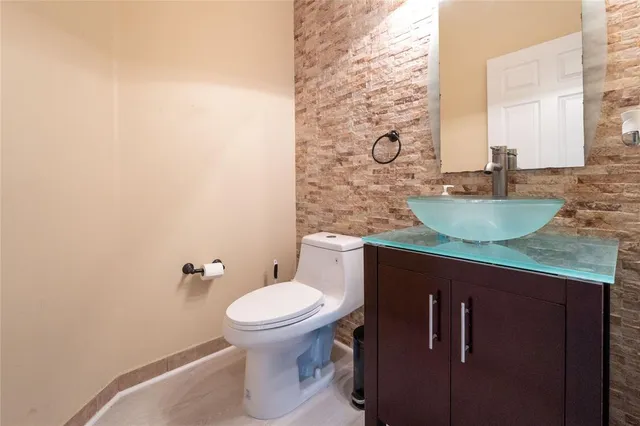 a bathroom with a sink and a toilet