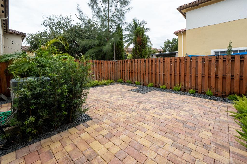 13519 Southwest 50th Court Miramar, FL 33027 - Photo 13 of 26 a view of a backyard with pathway