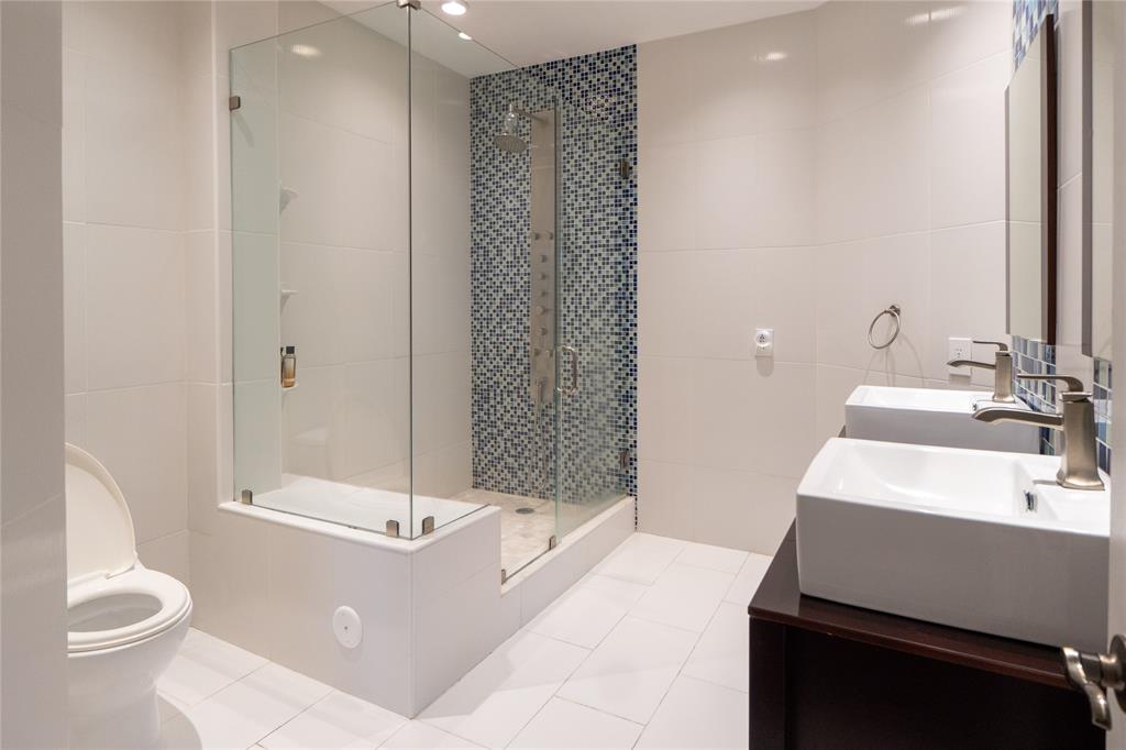 13519 Southwest 50th Court Miramar, FL 33027 - Photo 18 of 26 a bathroom with a sink a toilet and shower