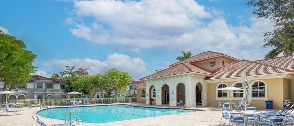 13519 Southwest 50th Court Miramar, FL 33027 - Photo 23 of 26 a large white building with a white roof