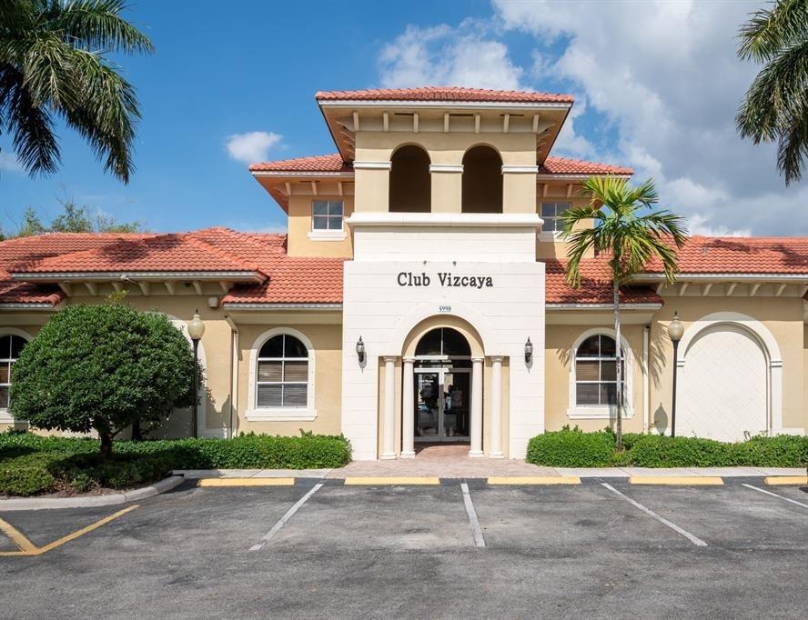 13519 Southwest 50th Court Miramar, FL 33027 - Photo 24 of 26 a front view of a house with a yard
