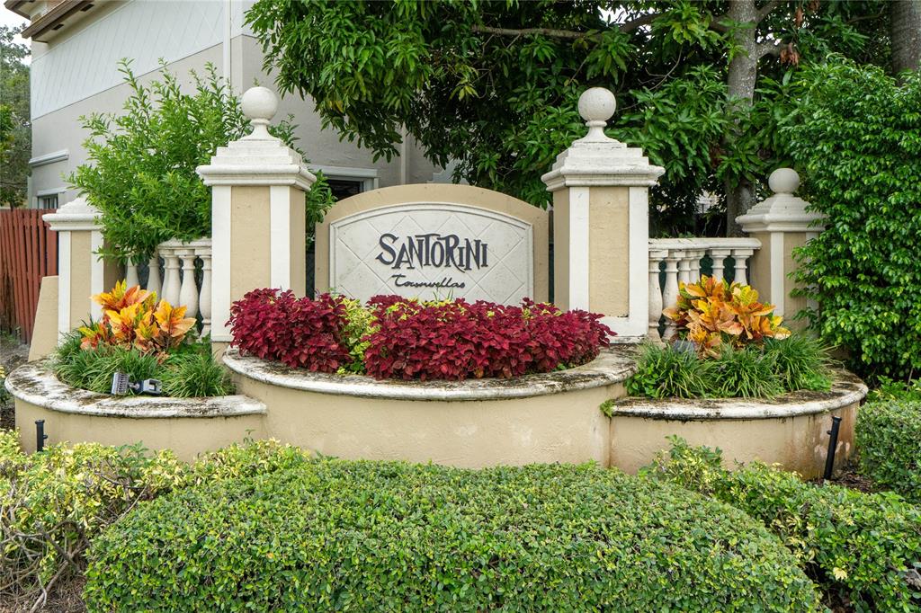 13519 Southwest 50th Court Miramar, FL 33027 - Photo 25 of 26 a front view of a house with a yard and fountain