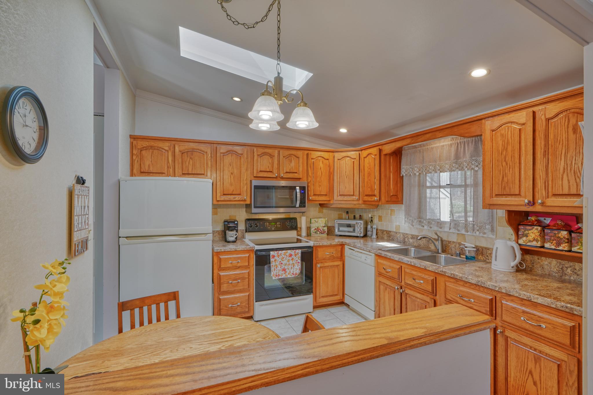 9302 Orbitan Road Parkville, MD 21234 - Photo 14 of 41 Dining room has opening to kitchen