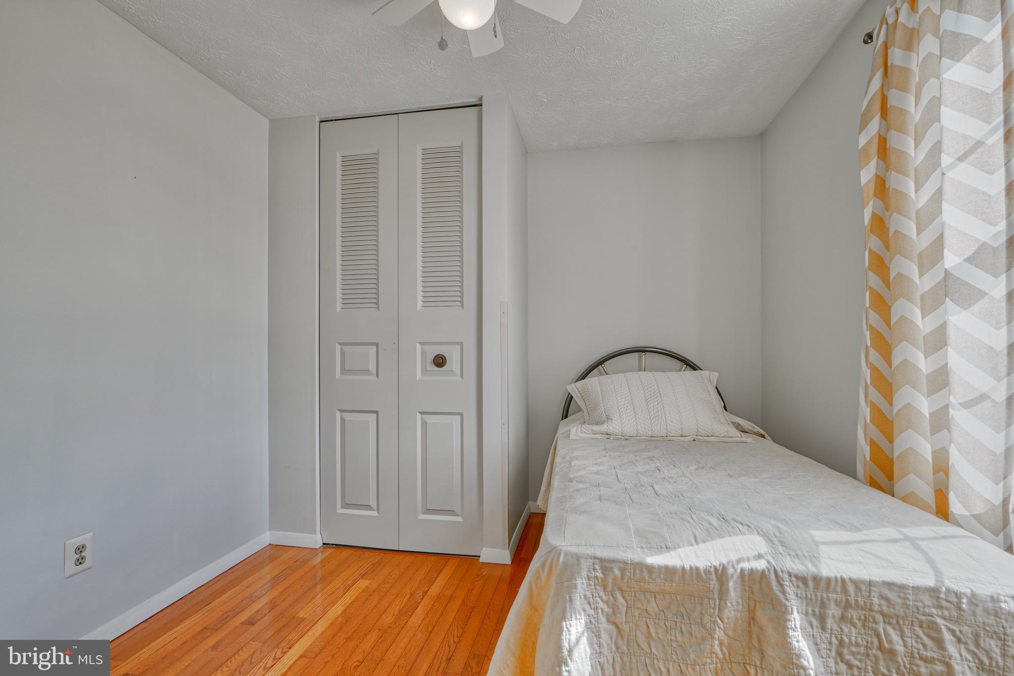 9302 Orbitan Road Parkville, MD 21234 - Photo 25 of 41 3rd bedroom has hardwood flooring