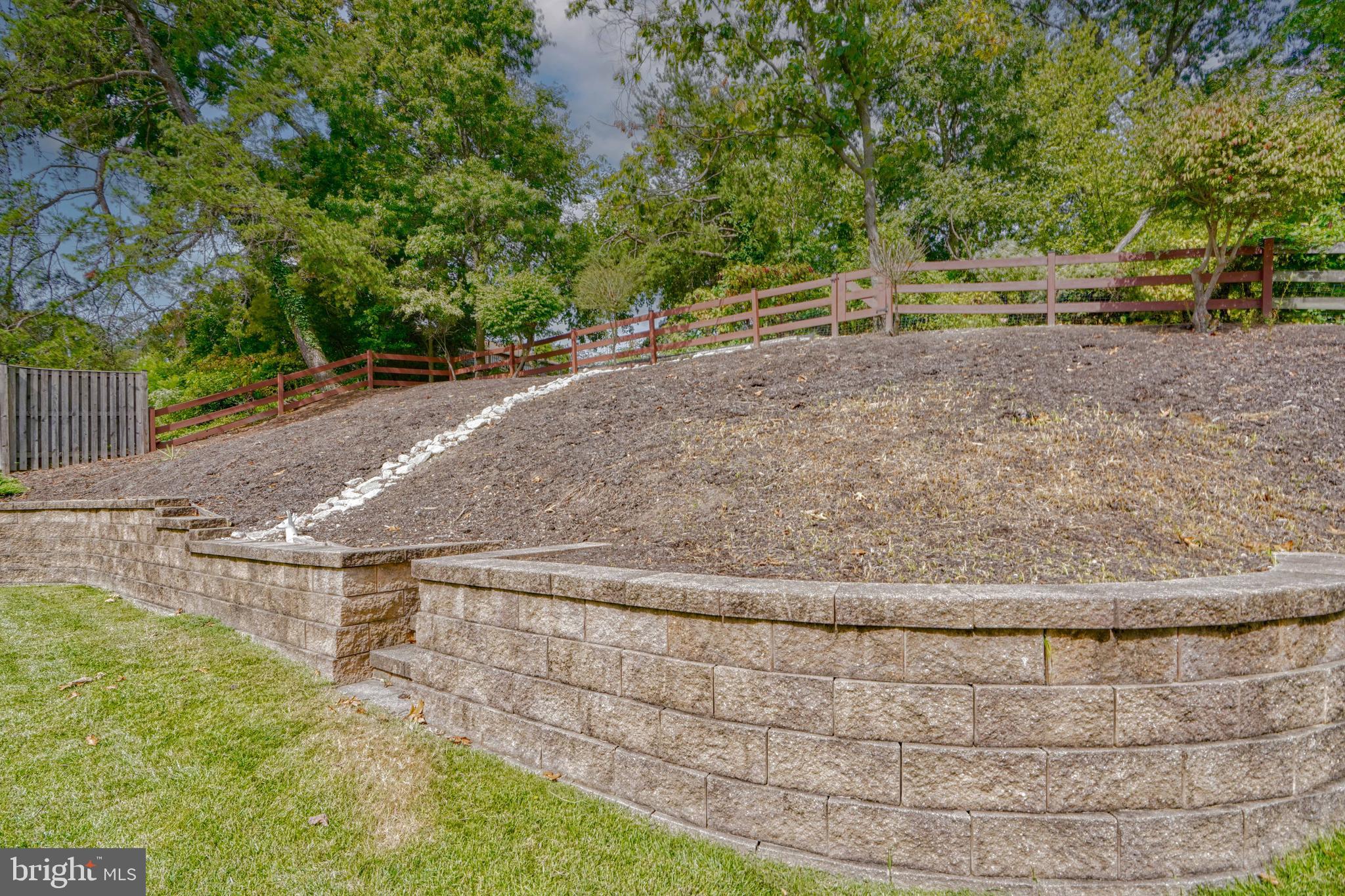 9302 Orbitan Road Parkville, MD 21234 - Photo 33 of 41 updated stone retaining wall