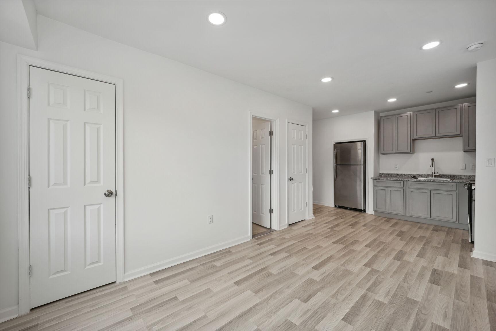 1642 16th Street Southeast, Unit 3 Washington, DC 20020 - Photo 4 of 22 a view of kitchen with wooden floor