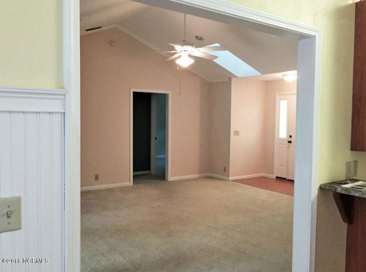 128 Cedar Road Pine Knoll Shores, NC 28512 - Photo 15 of 31 Living Room from Kitchen