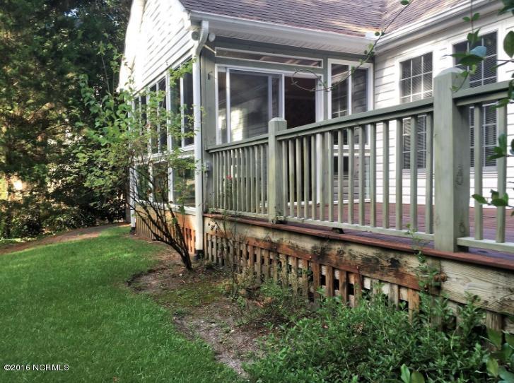 128 Cedar Road Pine Knoll Shores, NC 28512 - Photo 29 of 31 Large Deck off Sunroom