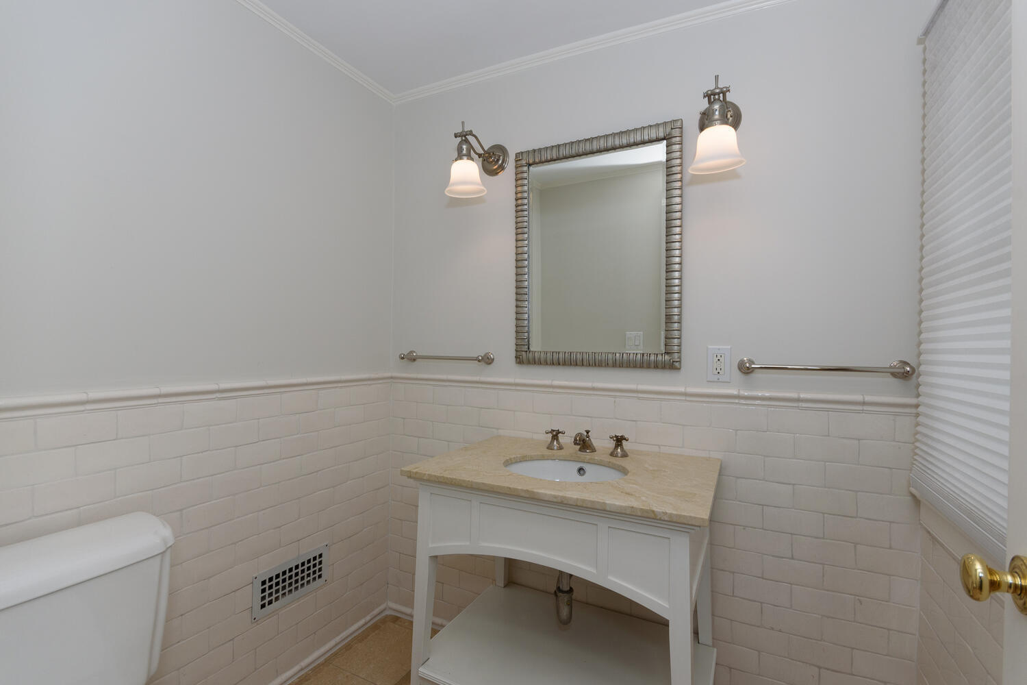 73 Roton Avenue Rowayton, CT 06853 - Photo 11 of 31 a bathroom with a sink mirror and toilet