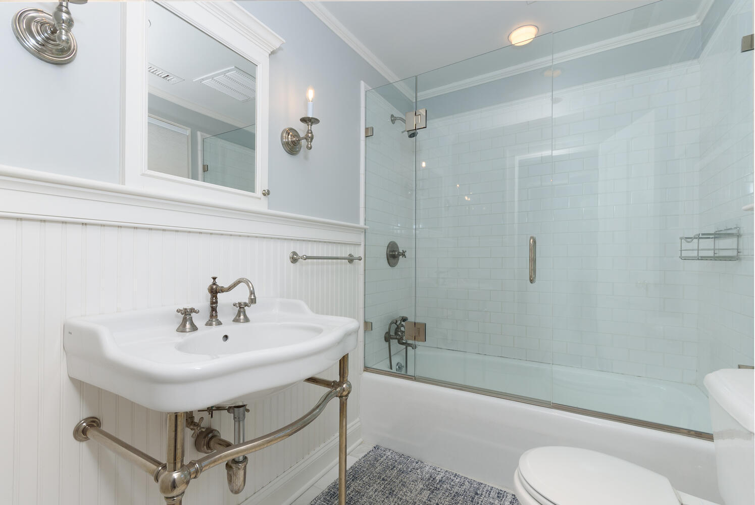 73 Roton Avenue Rowayton, CT 06853 - Photo 14 of 31 a bathroom with a sink toilet and shower