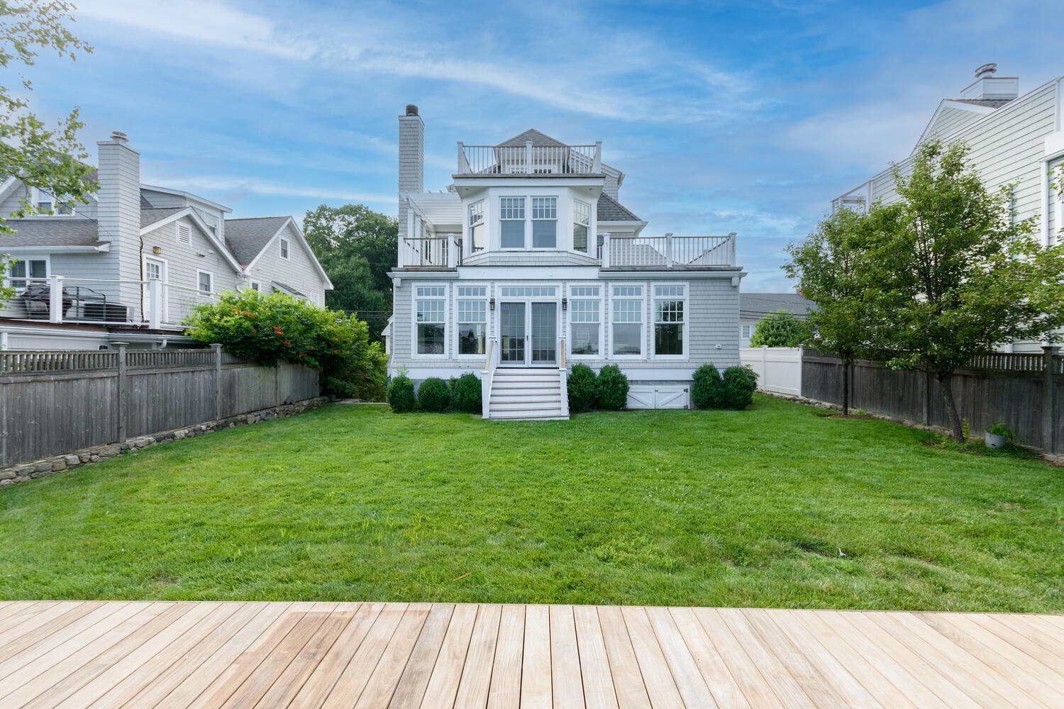 73 Roton Avenue Rowayton, CT 06853 - Photo 28 of 31 a front view of a house with a yard