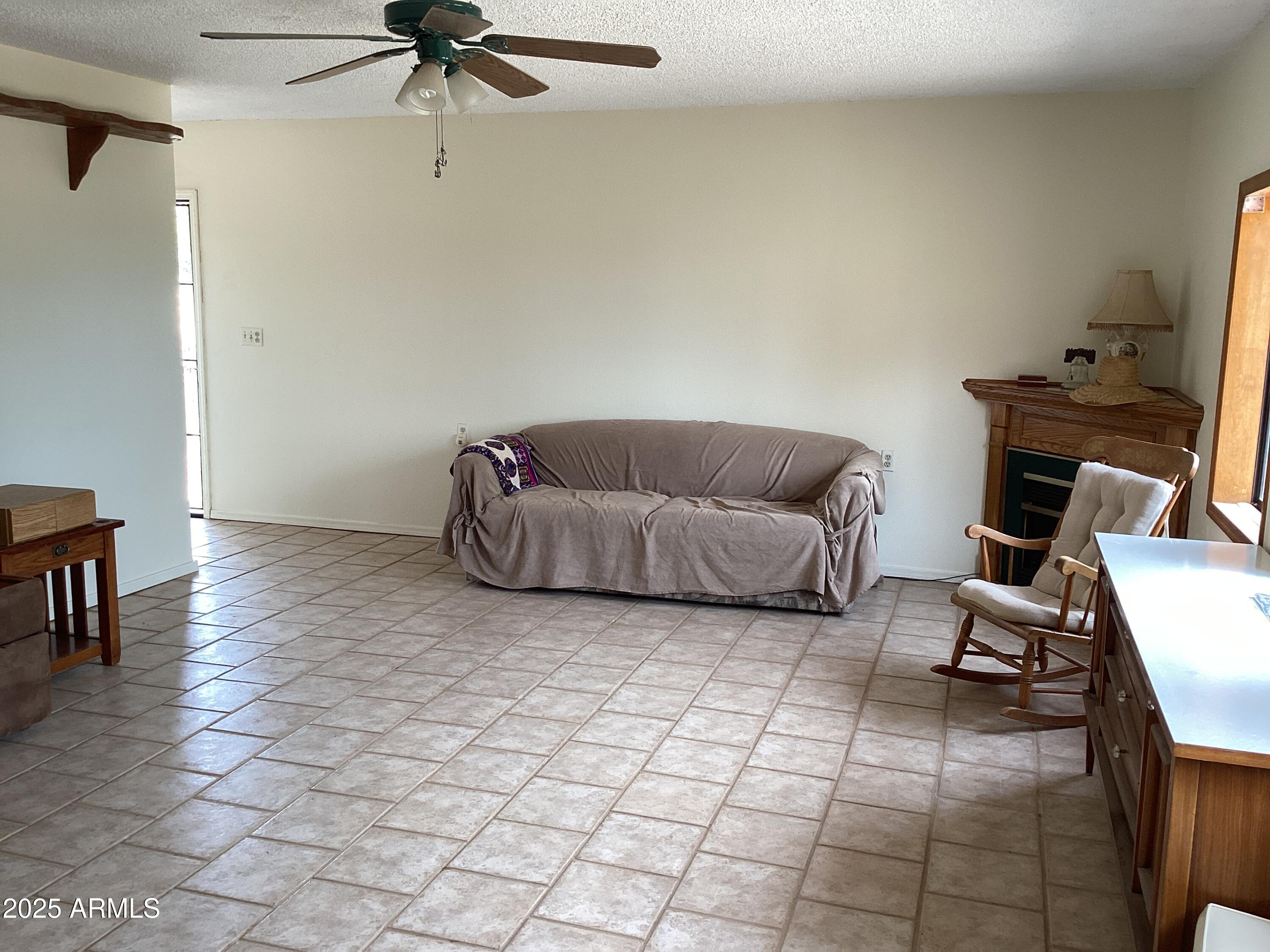 28 Cochise Way Cochise, AZ 85606 - Photo 14 of 51 a living room with furniture and a flat screen tv