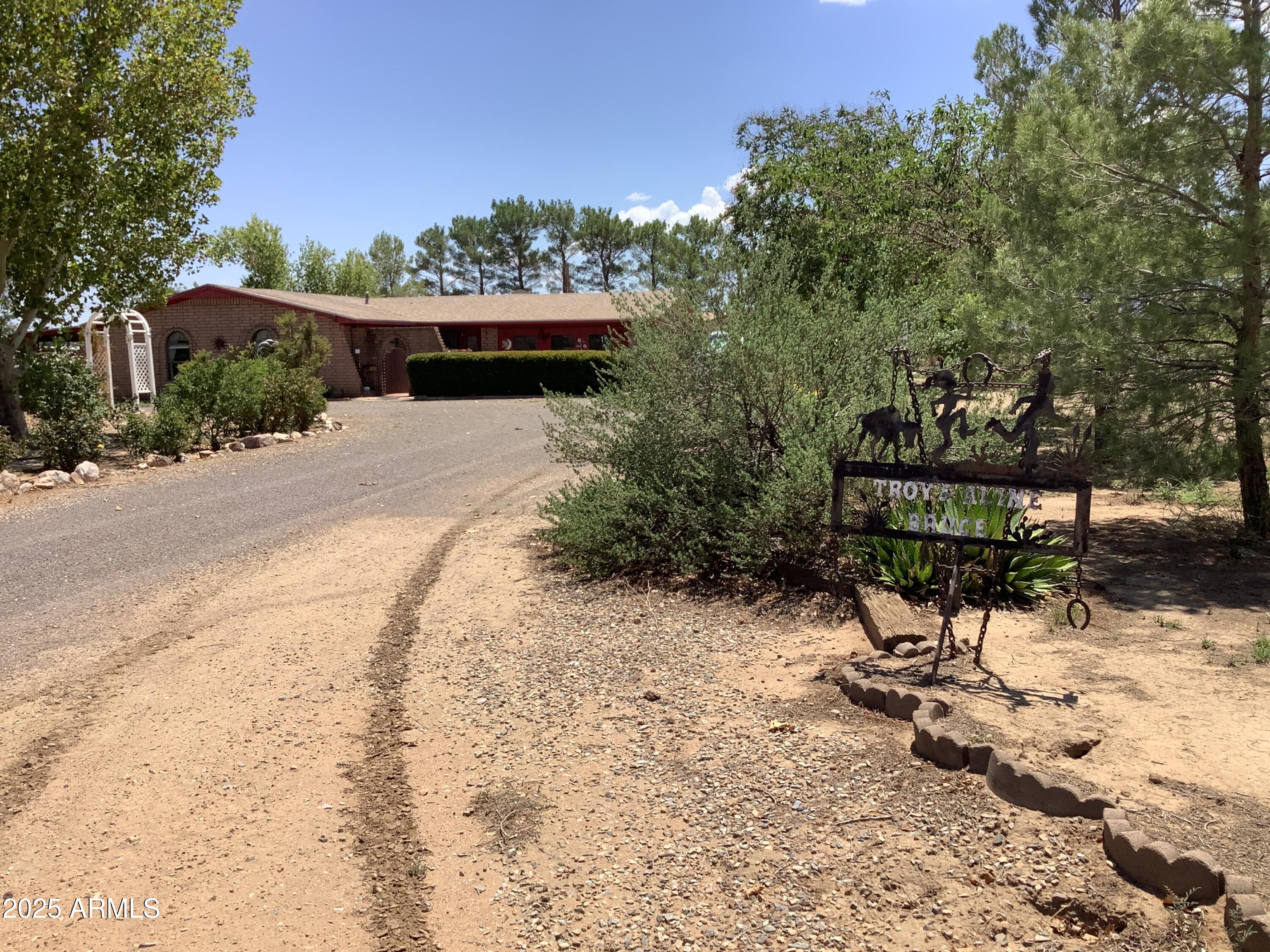 28 Cochise Way Cochise, AZ 85606 - Photo 41 of 51 a view of a bench in the backyard of a house