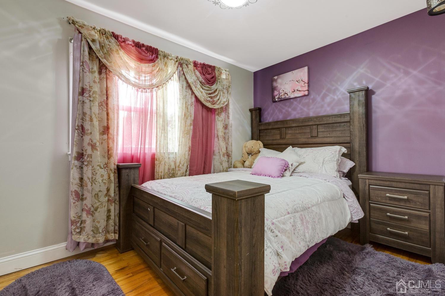 7 Colburn Road East Brunswick, NJ 08816 - Photo 18 of 25 a bedroom with a bed and a dresser