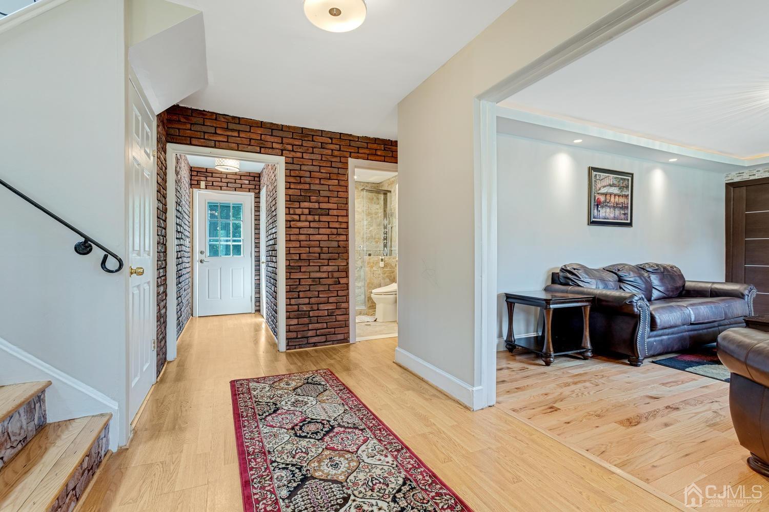 7 Colburn Road East Brunswick, NJ 08816 - Photo 5 of 25 a bedroom with furniture and a rug