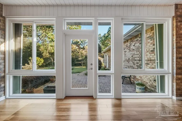 a view of a living room and window