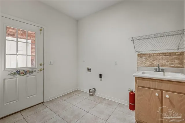 a view of a bathroom with a sink and a window