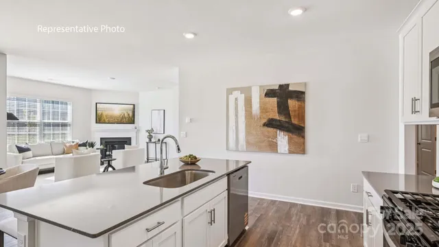 a en suite bathroom with a sink and a mirror