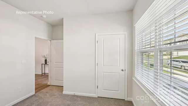 a view of a room with windows