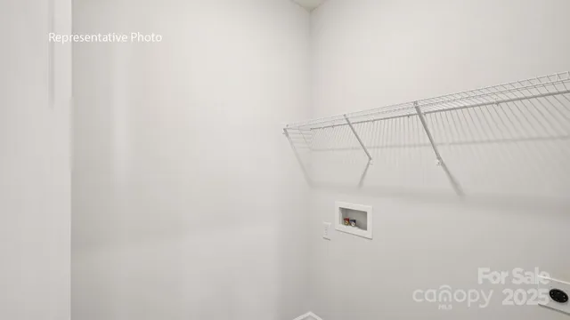 a view of a room with racks on the wall