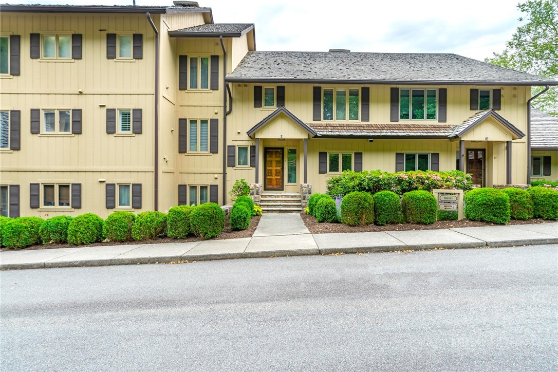 361 The Lakes, Unit C9 Boone, NC 28607 - Photo 2 of 47 a front view of multiple houses