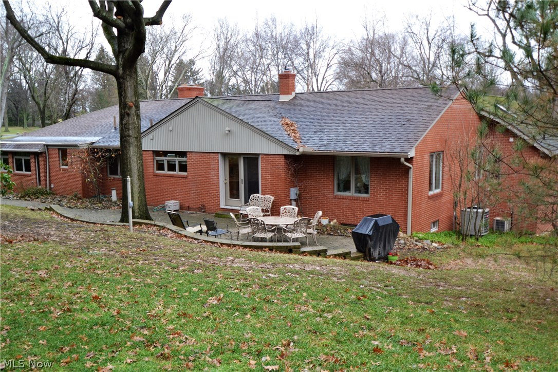 2737 Glenmont Road Northwest Canton, OH 44708 - Photo 31 of 33 Backyard brick patio with natural gas grill