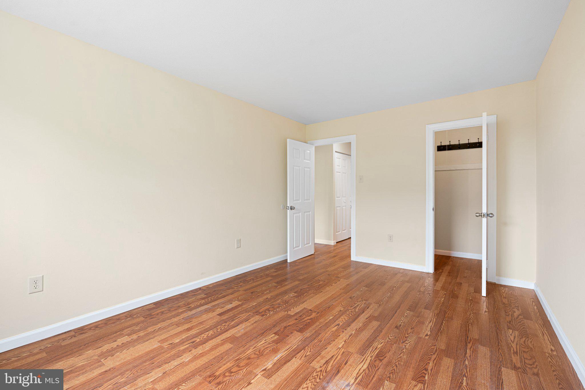 3281 Red Lion Road, Unit 2 Philadelphia, PA 19114 - Photo 9 of 15 Spacious room with warm wood floors.