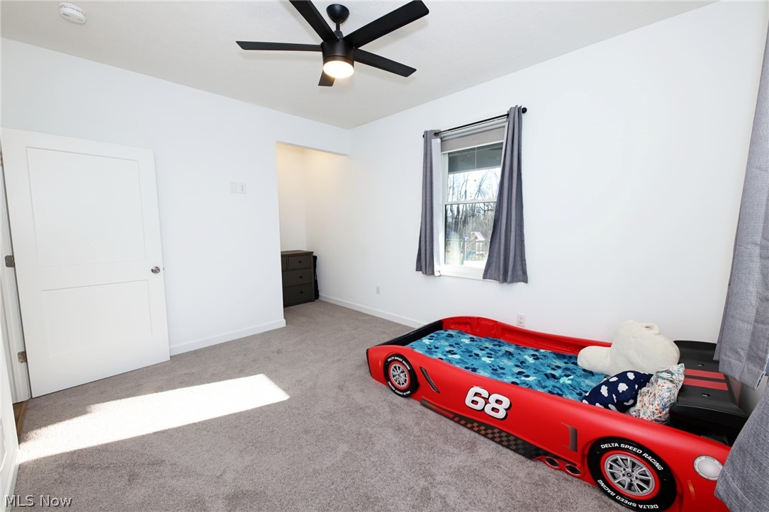 258 Friendly Acres Road Wellsburg, WV 26070 - Photo 15 of 47 Bedroom featuring carpet and a ceiling fan