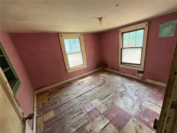 a view of an empty room and window