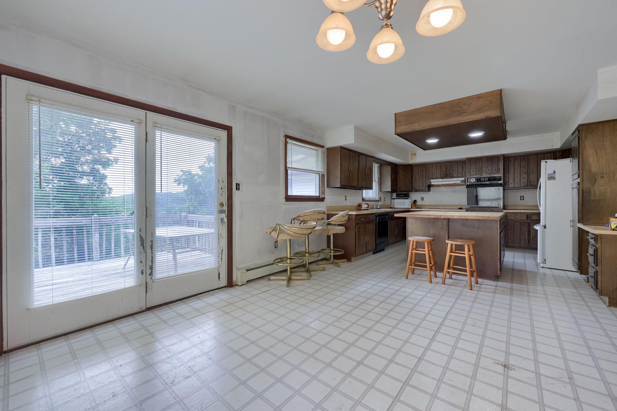 49 Preston Road Reading, PA 19608 - Photo 13 of 42 Spacious kitchen with natural light.