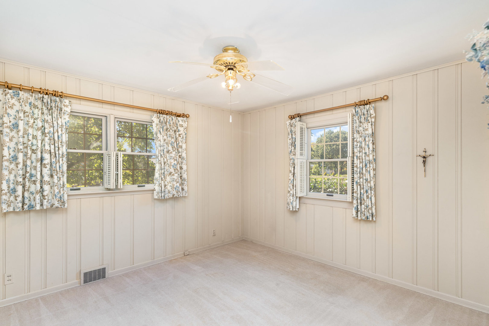 1703 West Acres Road Joliet, IL 60435 - Photo 18 of 33 an empty room with windows and chandelier fan