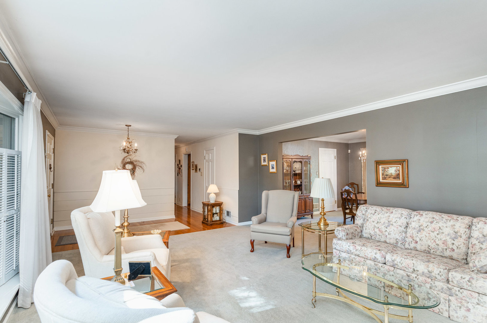 1703 West Acres Road Joliet, IL 60435 - Photo 7 of 33 a living room with furniture and a large window
