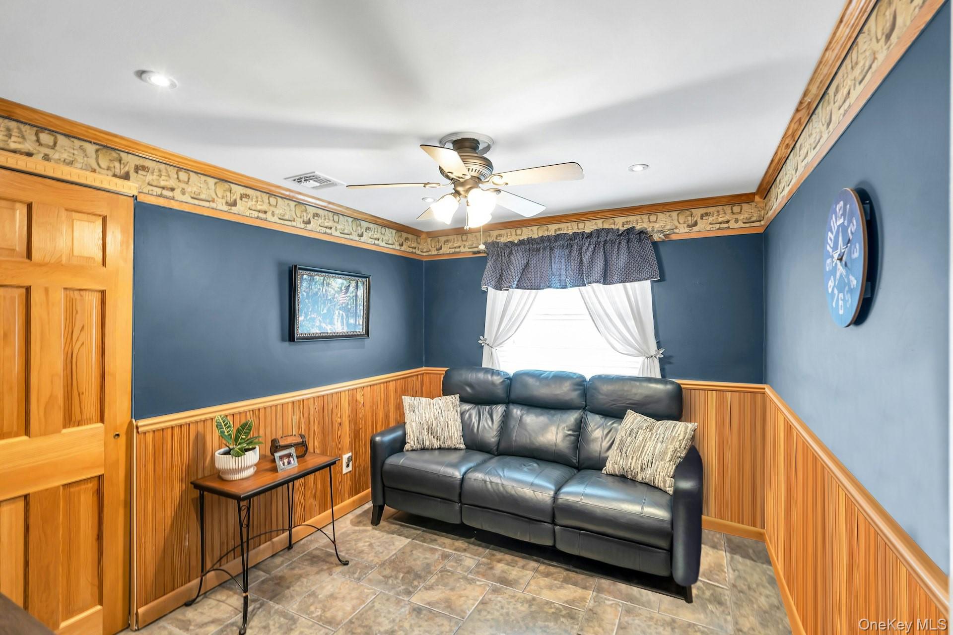 71 Ridge Haven Drive Ridge, NY 11961 - Photo 15 of 23 Bedroom With Wainscot, Molding & Tile Floor