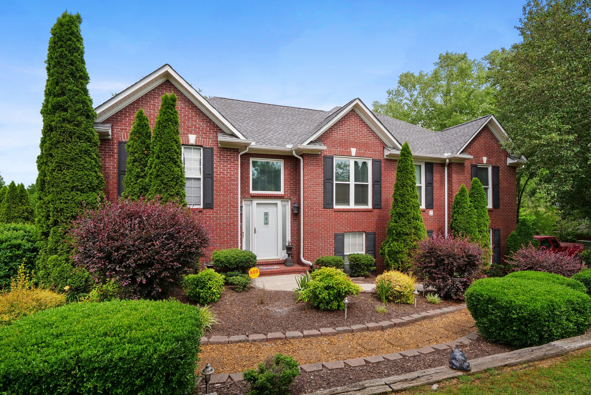 832 Rands Way Columbia, TN 38401 - Photo 1 of 49 a front view of a house with garden