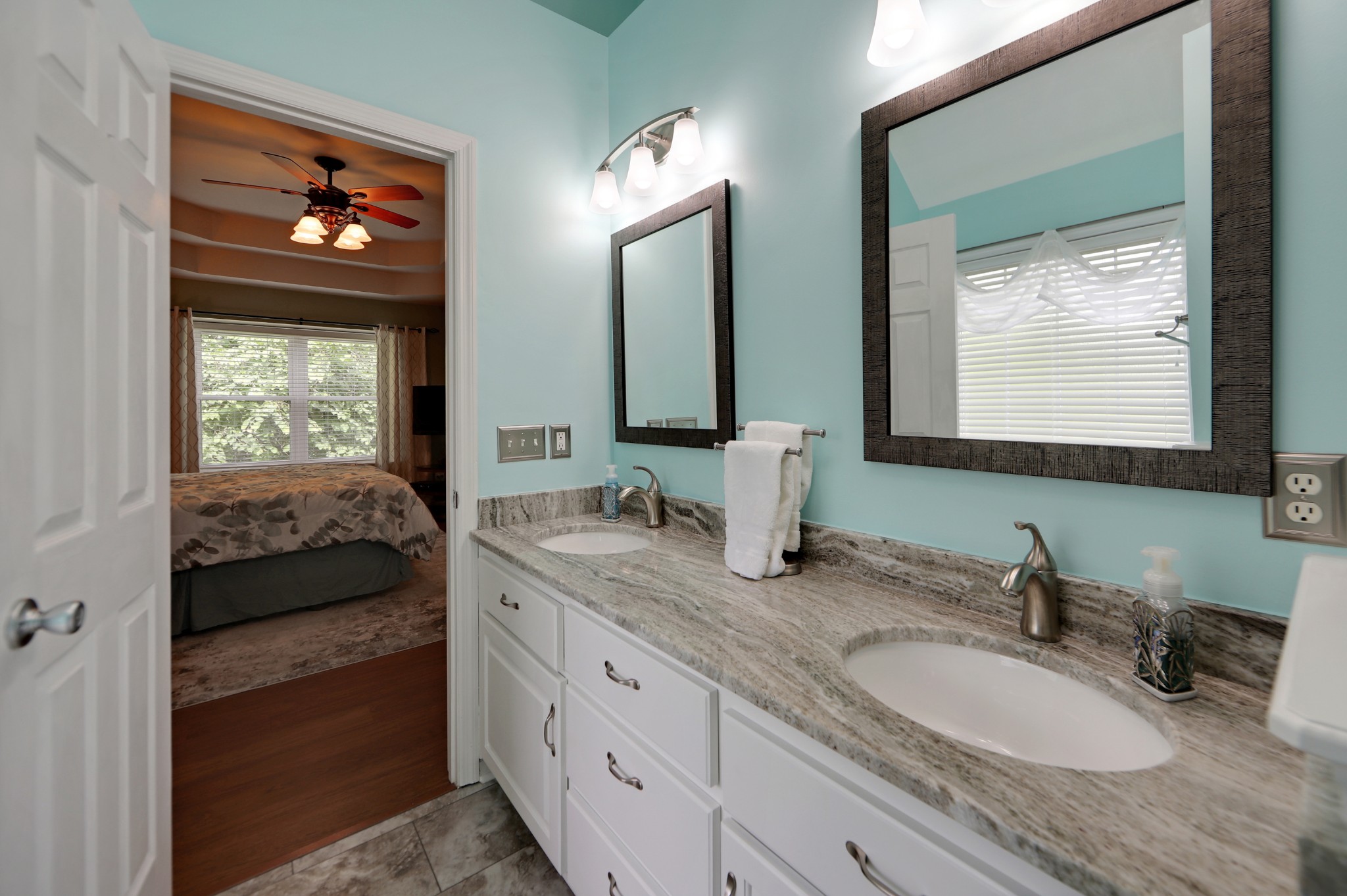 832 Rands Way Columbia, TN 38401 - Photo 24 of 49 a en suite bathroom with double vanity and a mirror