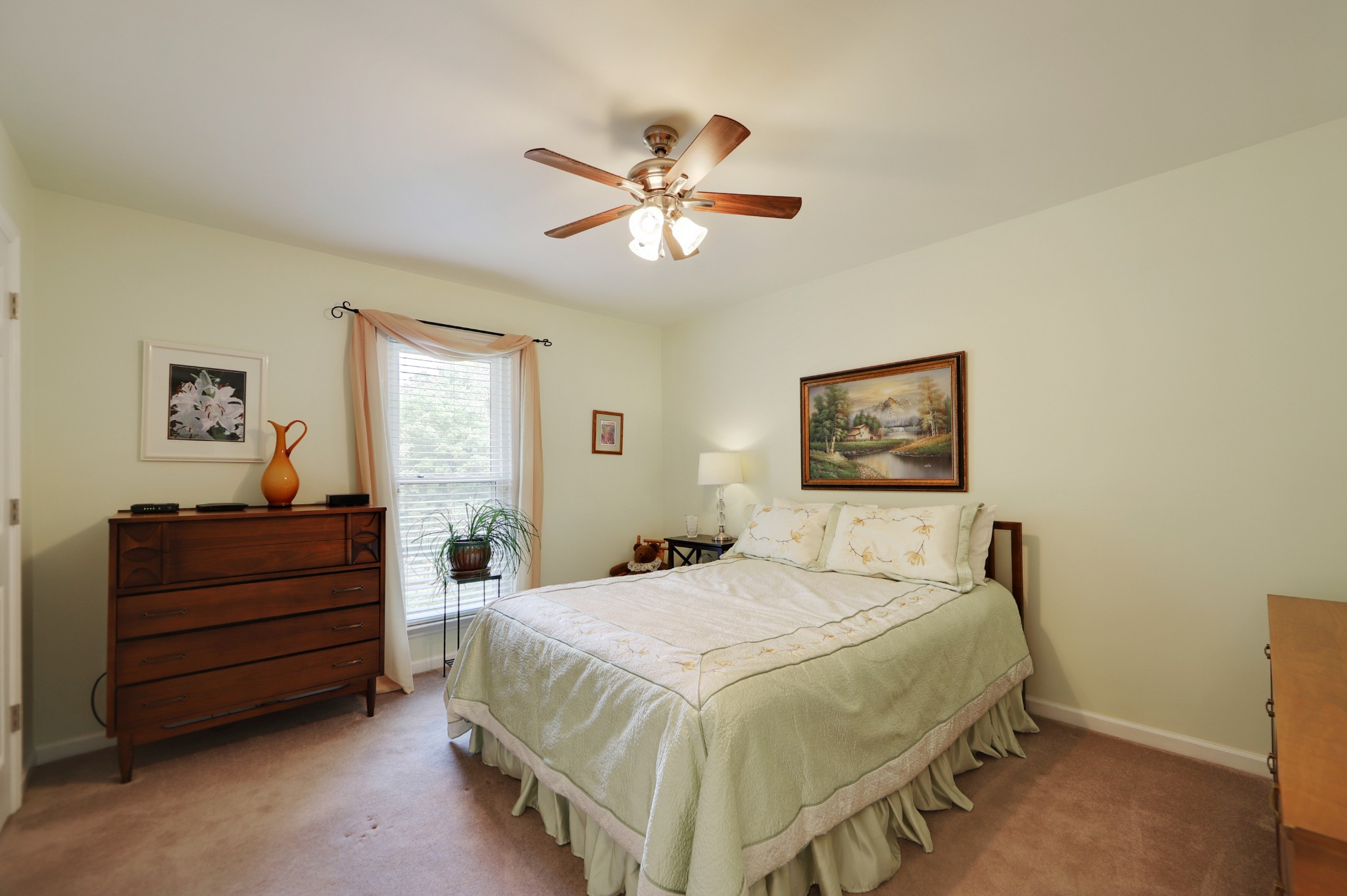 832 Rands Way Columbia, TN 38401 - Photo 26 of 49 a bedroom with a bed and a chandelier